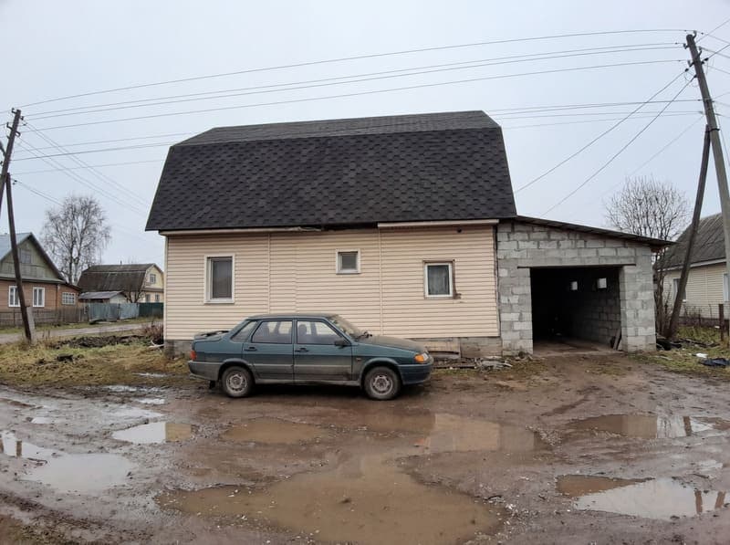 Дом с гаражом из блоков без фундамента